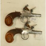 Pair of fine quality early 18th century ladies flintlock Muff pistols: With turn off barrels, length