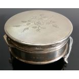 Circular silver lidded jewel box: Hallmarks for Birmingham 1960. Loaded base, 8.5cm wide.