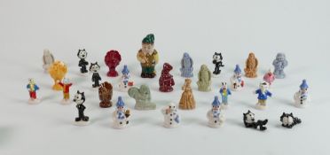 A collection of miniature Wade figures: Including sets of Rupert Bear, Snowman, Korky the cat etc.
