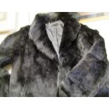 A vintage black ladies fur jacket: size 12.