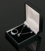 Quality silver and blue topaz gem set of jewellery: comprising necklace-with earrings and pendant