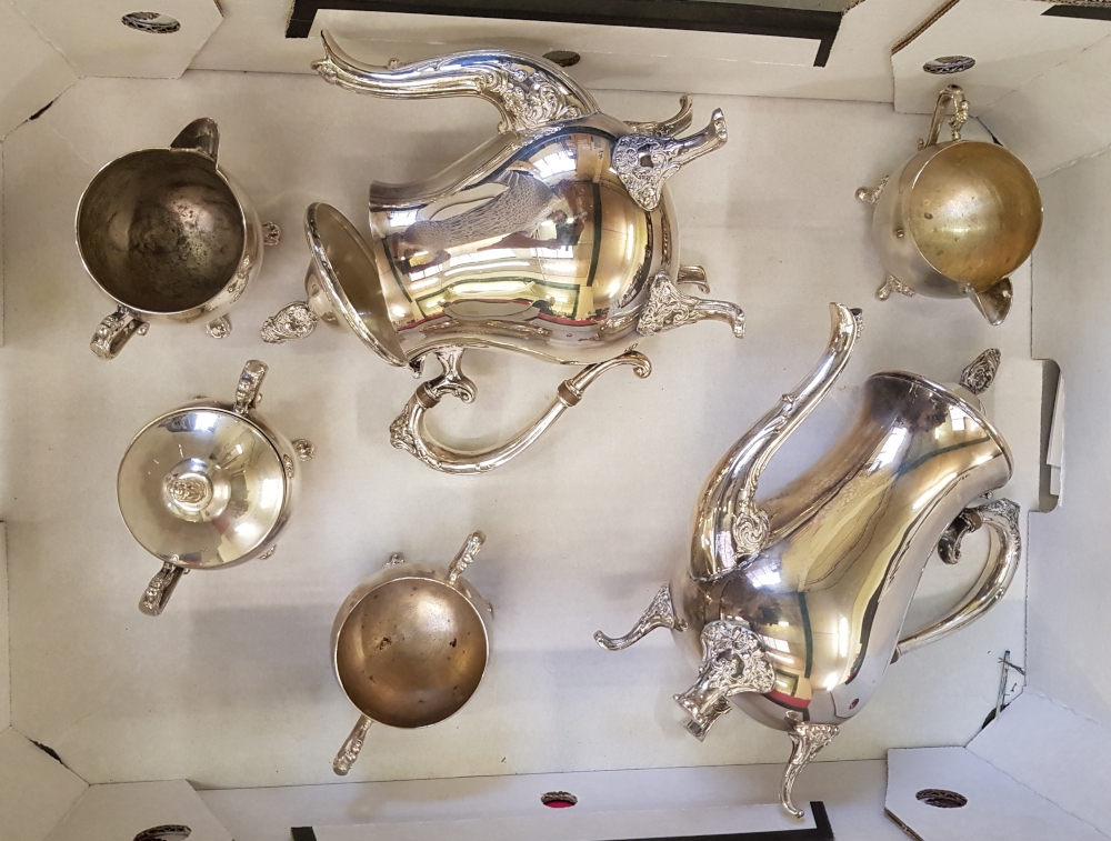 A mixed collection of silver plated and white metal items: two three piece coffee services