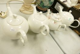 Four Un decorated teapots(4):