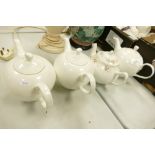 Four Un decorated teapots(4):