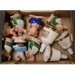A mixed collection of ceramic items to include: seven Natwest pigs, three Wade commemorative