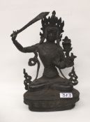 Large old oriental bronze figure of Deity: