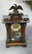 Wooden Cased German Mantle Clock: height to top of eagle 67cm