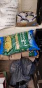A quantity of compost: horticultural sand and a 25kg bag of magnesium sulphate.