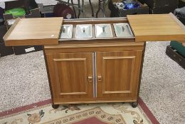 Heated hostess/serving trolley cabinet: 74cm wide.