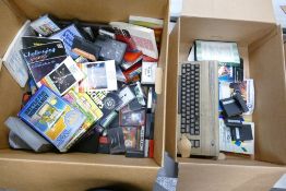 A large collection of Vintage Commodore C64 computer games: cartridges manuals & books