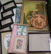 A mixed collection of items: picture frames, print etc.