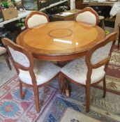 Quality modern inlaid walnut veneer circular dining table and 4 chairs: table raised on turned