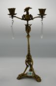 Italian Brass Roman Theme Candelabra: with cut glass lusters, height 36cm