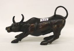 A large bronze figure of a bull: