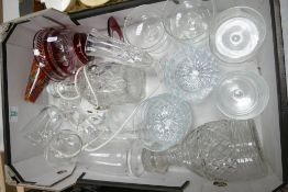 A mixed collection of items to include: Edwardian glass decanter, later ruby glass goblet, converted