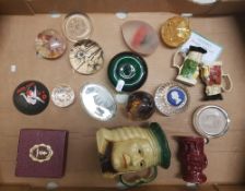 A mixed collection of items to include: glass paperweights, toby jugs etc