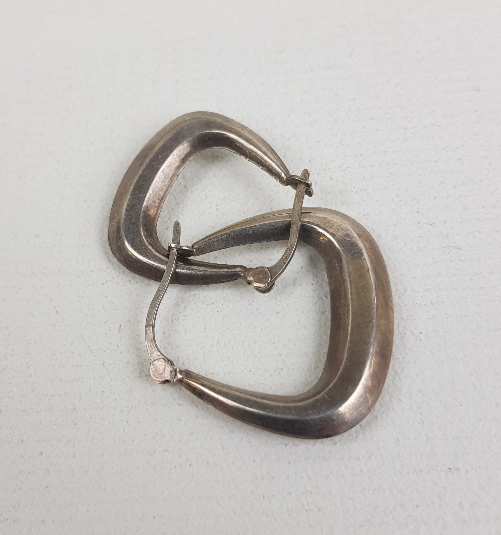 Pair of silver earrings, 1.285g: