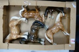A Collection of Large Pottery Horses: