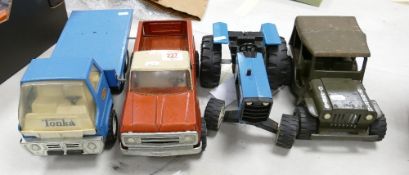 A collection of Vintage Tonka Toys to include: Flat Bed Lorry , American Pick Up Truck, Tractor &