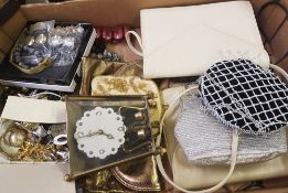 A mixed collection of items to include: brass koma clock, vintage handbags and a quantity of costume