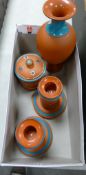 Terracotta Torquay Ware items to include: Vase, Lidded box & candlesticks