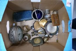 A mixed collection of items to include: Clocks, Tobacco tins, cigarette cases, silver plated
