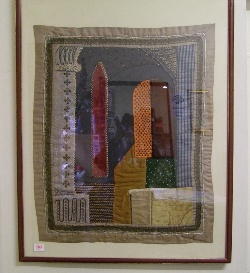 A framed Islamic tapestry : 100cm x 79cm