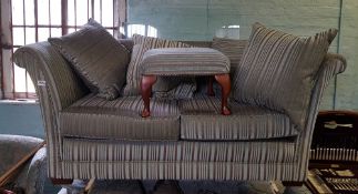 A striped 2 tone fabric 2 seater sofa: together with matching footstool.