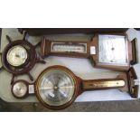 A collection of 3 wooden barometers: