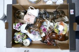 A mixed collection of items to include: ceramic horses, floral tea ware, ceramic flowers etc
