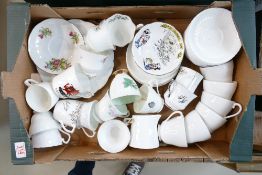 A mixed collection of items to include: un decorated tea ware, commemorative cups etc