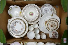 A collection of floral gilt decorated dinner & tea ware: