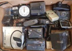 A collection of vintage cameras and lenses: Conway, Brownie model D, Hawkeye model C, Polaroid