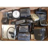 A collection of vintage cameras and lenses: Conway, Brownie model D, Hawkeye model C, Polaroid