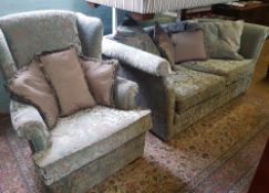 A floral 2 tone fabric 2 seater sofa: together with matching wingback armchair.