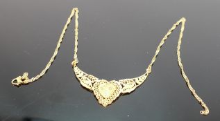 Asian yellow metal ornate necklace: tests to 22ct gold or higher, 8.6g.