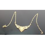 Asian yellow metal ornate necklace: tests to 22ct gold or higher, 8.6g.