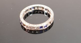 9ct white gold eternity ring: size L, set with sapphire and diamonds. (2 stones missing)2.9g.