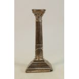 Large silver candlestick damaged and matching previous lot: A loaded square based corinthian