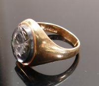 9ct gentleman's signet ring: set with black onyx centurions head stone, 7.8g.