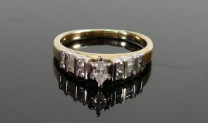 14ct gold diamond ring: Centre oval diamond surrounded by baguette and round diamonds, size Q, 4.3g.