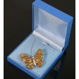 Silver Butterfly pendant and chain: Marked 925, butterfly set with stones.