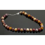 Polished various coloured stone and silver necklace: