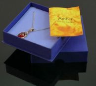 Amber & silver pendant and necklace: