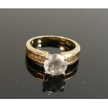 Silver gold coloured ring set with solitaire cubic zirconia: size M/N,4.7g.