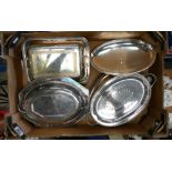 Three lidded silver plated entree or vegetable dishes: and an open serving dish