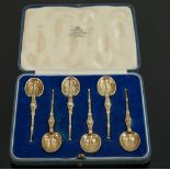 Set of 6 cased Silver gilt spoons hallmarked for London 1936, 52.2g.