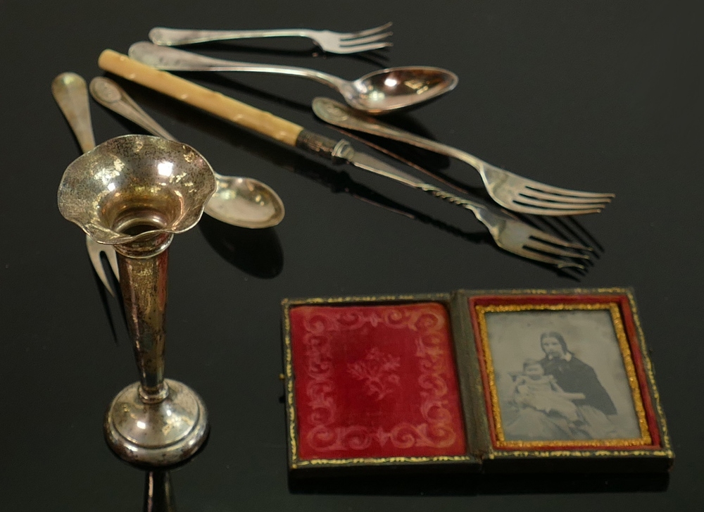 A collection of Silver cutlery: 67.6g, mini book picture frame, Christophe spoon, bone handled