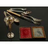 A collection of Silver cutlery: 67.6g, mini book picture frame, Christophe spoon, bone handled