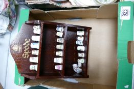 A collection of Spode Thimbles on Wooden stand:
